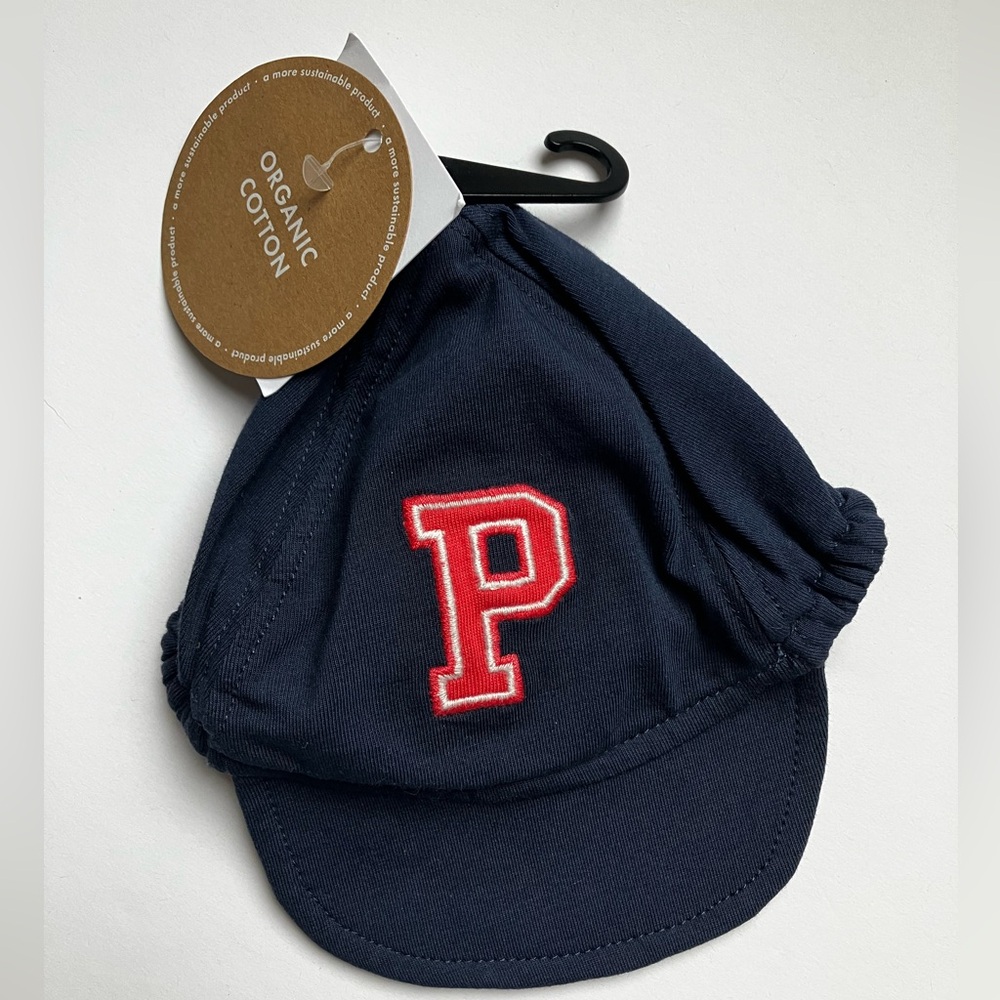 Polarn O. Pyret Navy Baby Cap with Red “P” monogram organic cotton